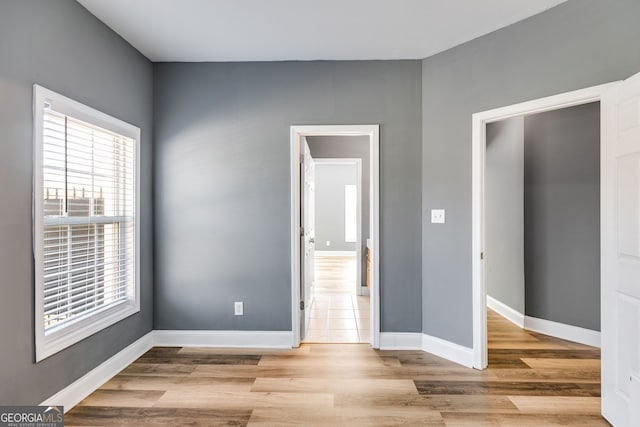 unfurnished bedroom with light hardwood / wood-style flooring