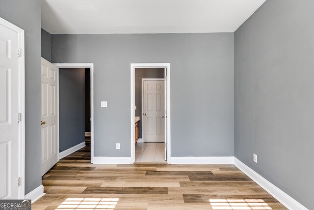 unfurnished bedroom featuring light hardwood / wood-style flooring