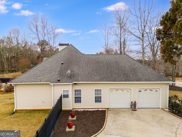exterior space with a garage