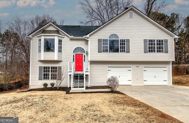 split foyer home featuring a garage