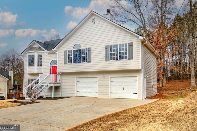 raised ranch featuring a garage