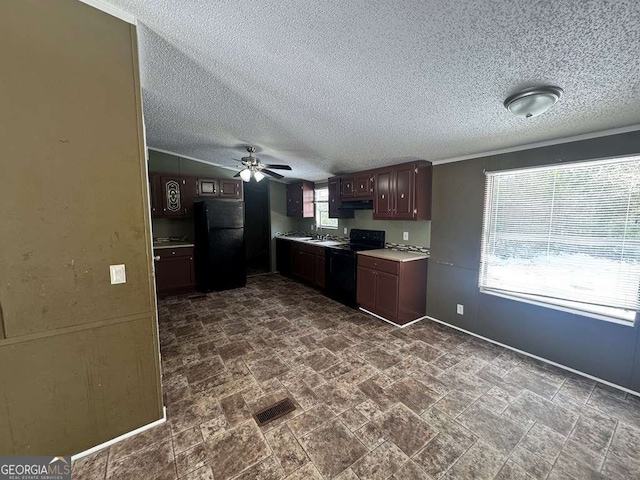 kitchen with visible vents, ceiling fan, stone finish floor, light countertops, and black appliances