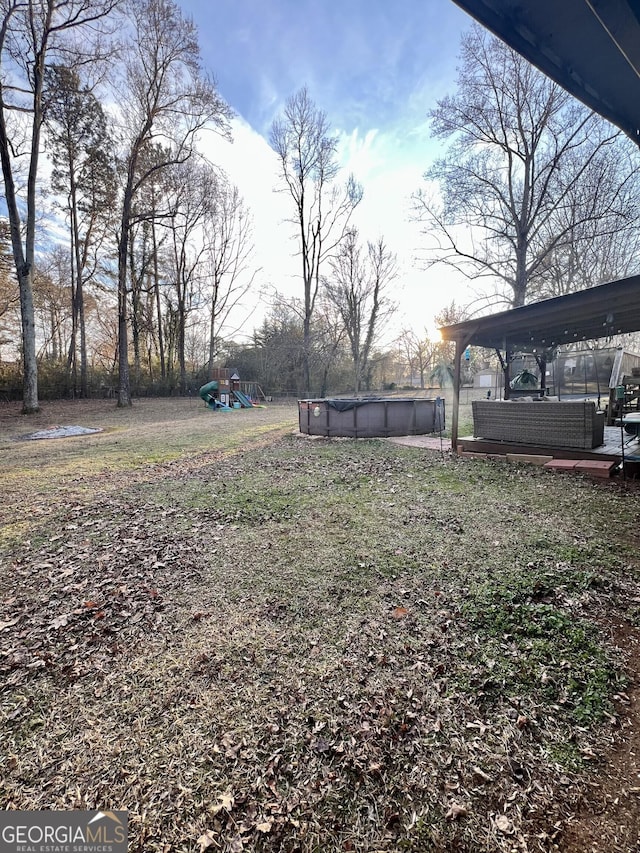 view of yard with a playground