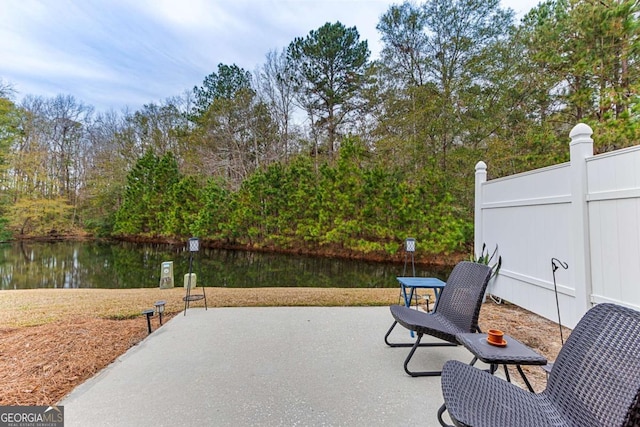 view of patio / terrace with a water view