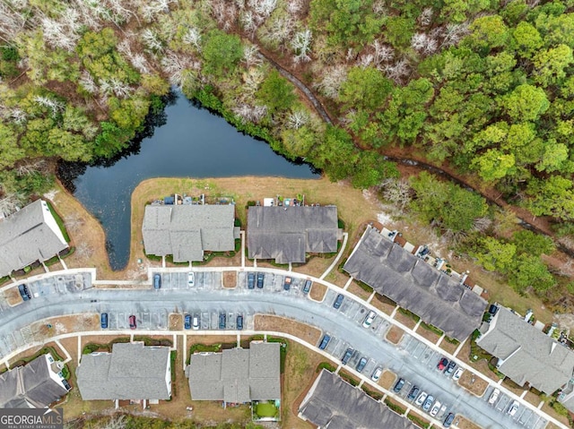 bird's eye view with a water view