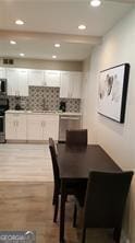 dining space featuring hardwood / wood-style flooring