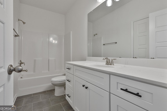 full bathroom with shower / bathing tub combination, vanity, tile patterned floors, and toilet