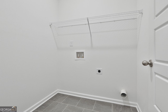 laundry area with hookup for an electric dryer and washer hookup