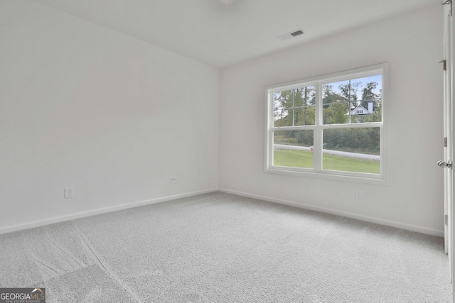 empty room with carpet flooring