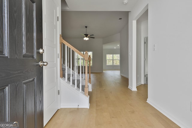 entryway featuring ceiling fan and light wood-type flooring