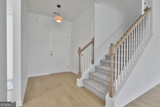 foyer entrance featuring light hardwood / wood-style flooring