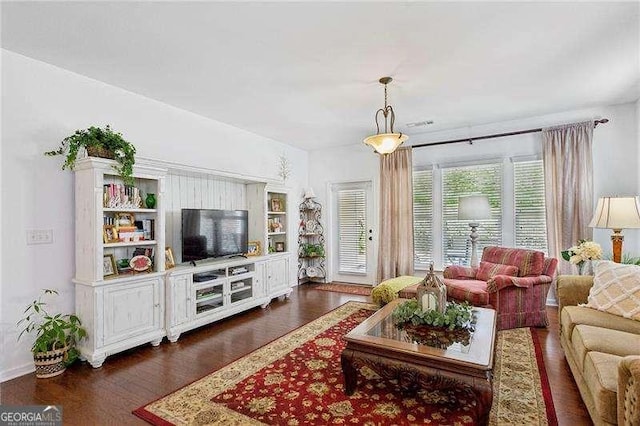 living room featuring dark hardwood / wood-style floors