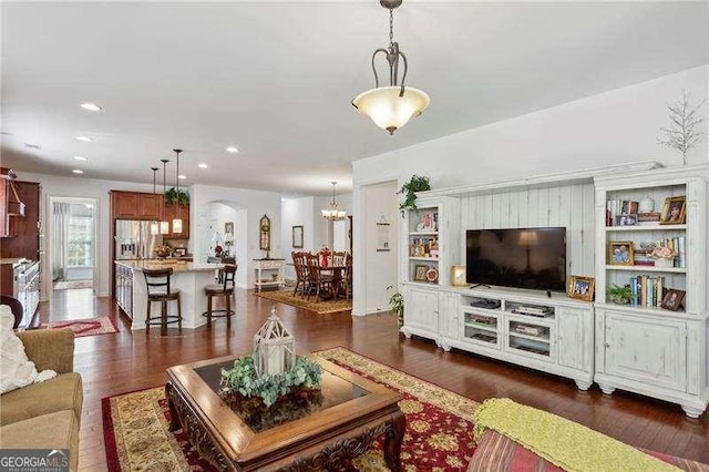 living room with dark wood-type flooring