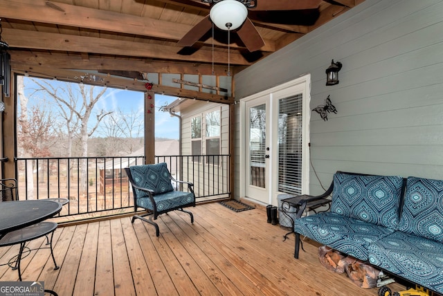 wooden deck with ceiling fan