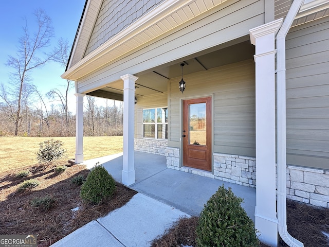 property entrance featuring a porch