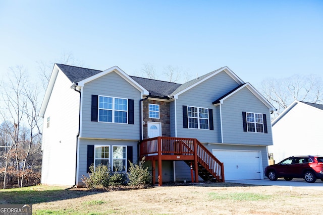 raised ranch featuring a garage