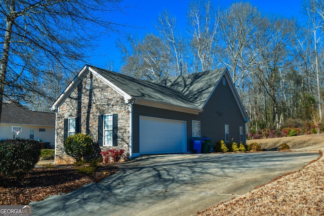 view of home's exterior featuring a garage