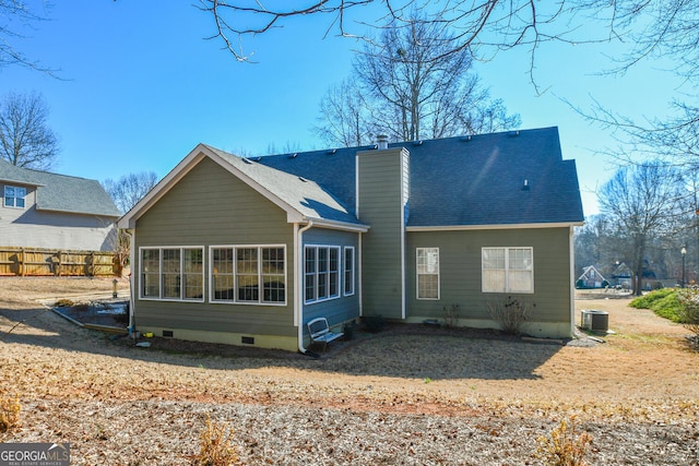 back of house featuring cooling unit