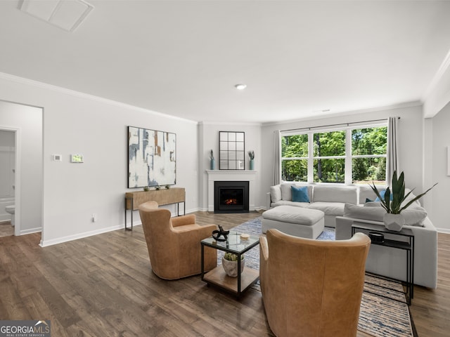 living room featuring crown molding and dark hardwood / wood-style floors