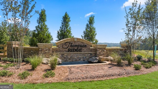 view of community sign