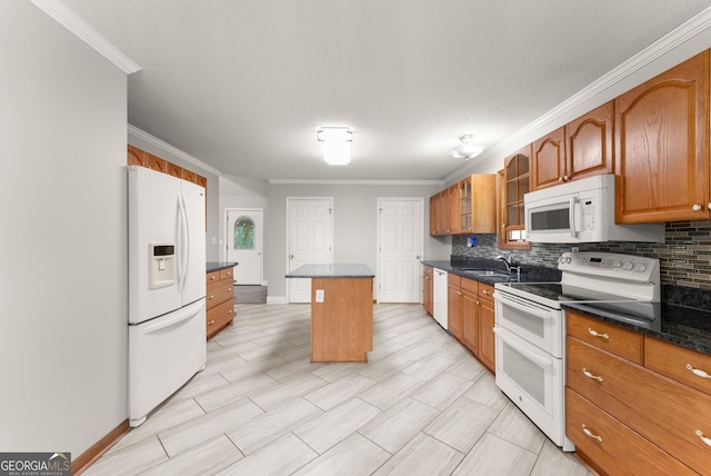 3366 Small Woods Ln, Gainesville, GA 30506 - kitchen with white appliances, backsplash, ornamental molding, glass insert cabinets, and brown cabinetry