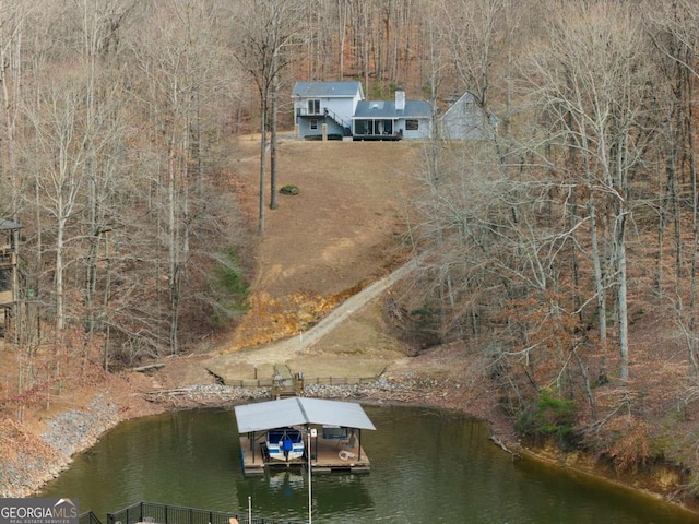 bird's eye view with a water view