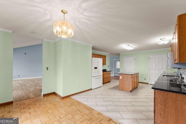 3366 Small Woods Ln, Gainesville, GA 30506 - kitchen with a center island, a sink, crown molding, baseboards, and white appliances
