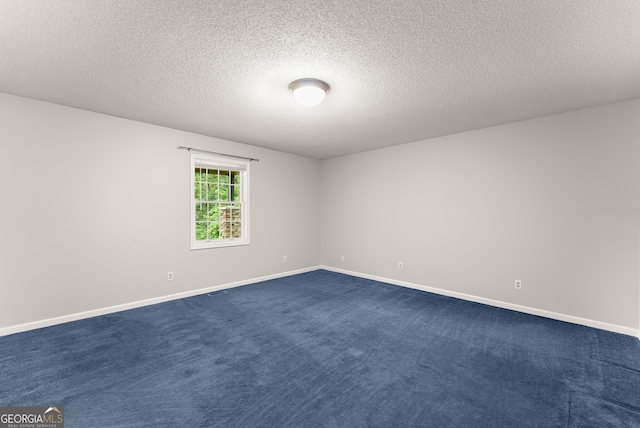 3366 Small Woods Ln, Gainesville, GA 30506 - unfurnished room with dark carpet and a textured ceiling