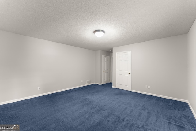 3366 Small Woods Ln, Gainesville, GA 30506 - unfurnished room featuring dark colored carpet and a textured ceiling