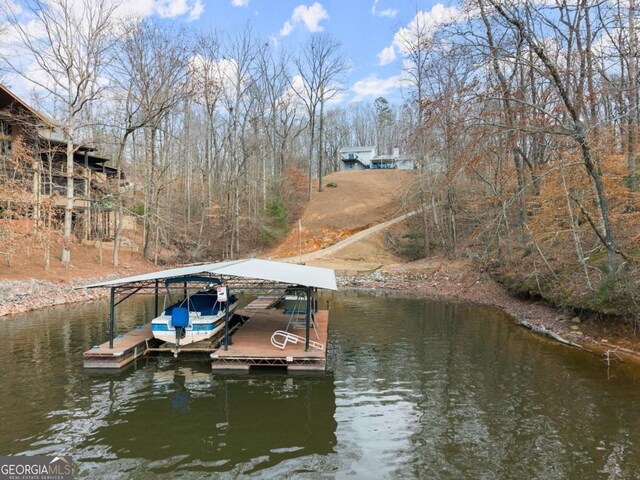 dock area featuring a water view