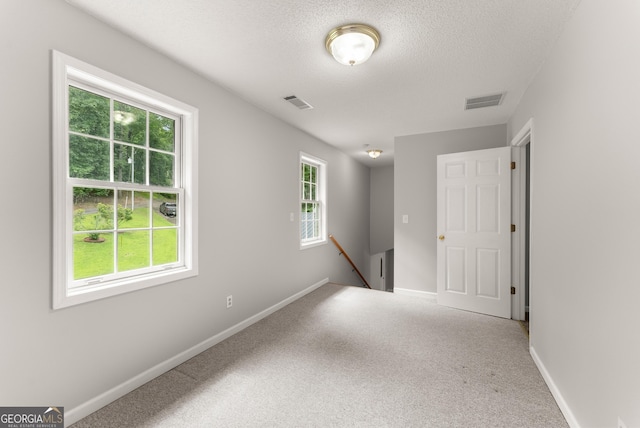 3366 Small Woods Ln, Gainesville, GA 30506 - spare room featuring a textured ceiling and carpet