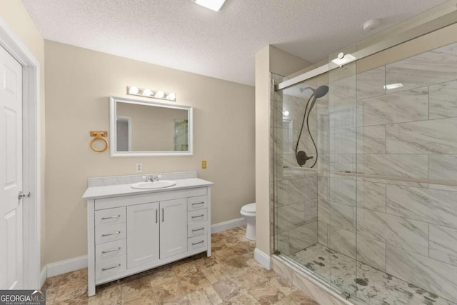 3366 Small Woods Ln, Gainesville, GA 30506 - bathroom featuring a shower stall, baseboards, vanity, and toilet
