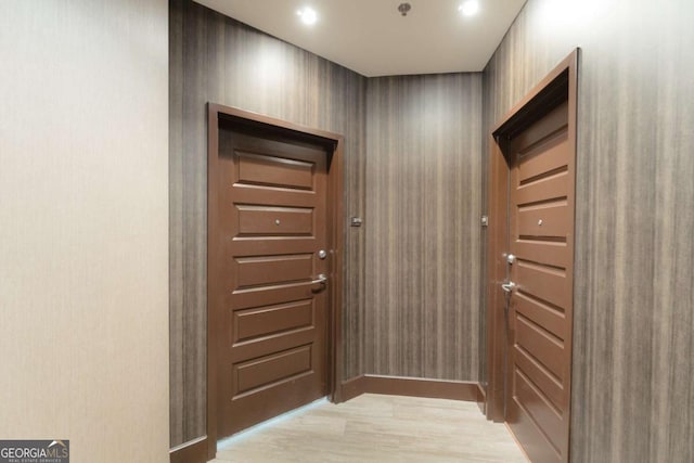 doorway featuring light hardwood / wood-style flooring