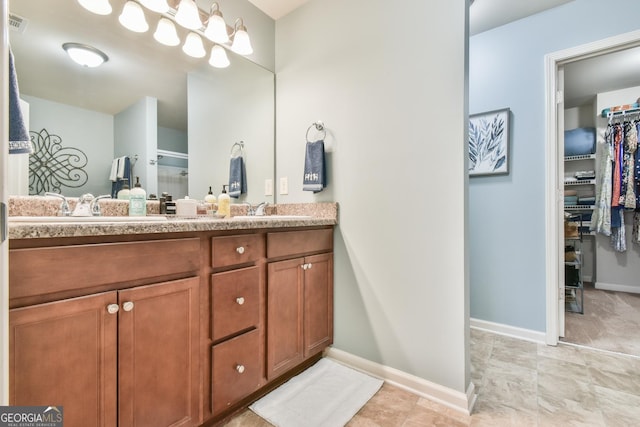 bathroom featuring vanity and walk in shower