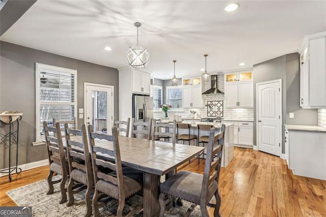 dining space featuring light hardwood / wood-style floors