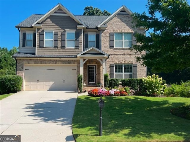 view of front facade featuring a garage and a front lawn