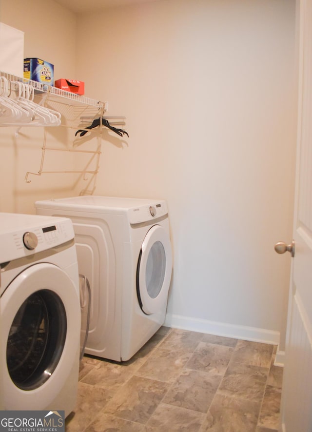 washroom featuring independent washer and dryer