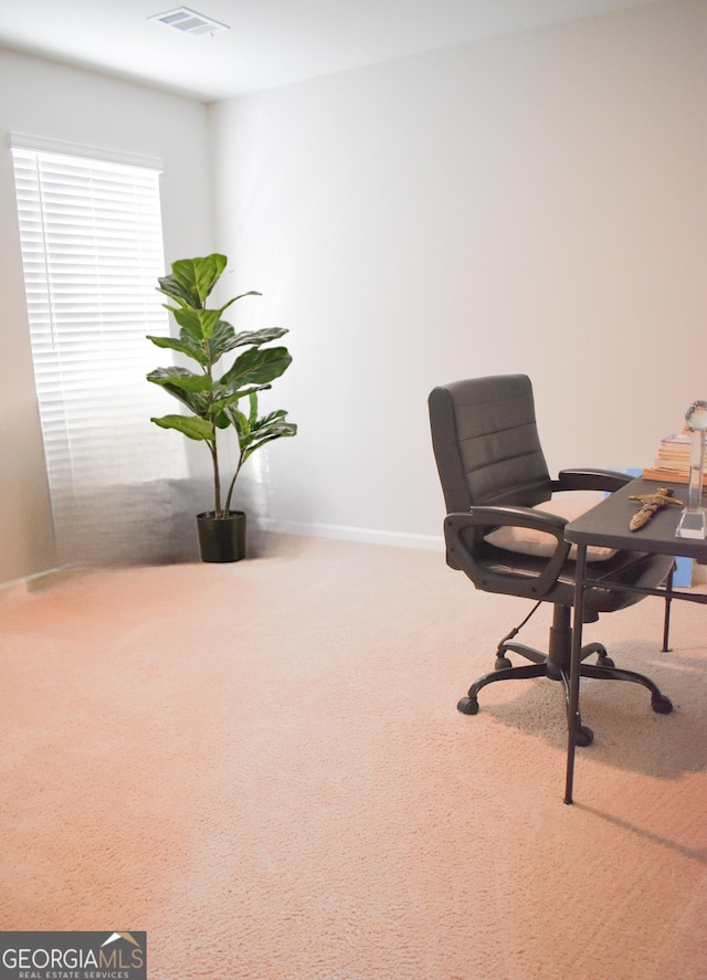 view of carpeted office space