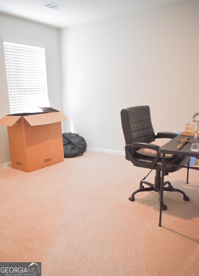 view of carpeted office space