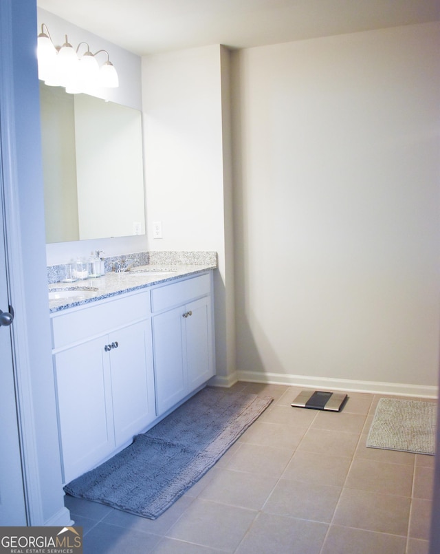 bathroom with vanity and tile patterned floors