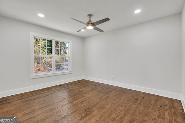 empty room with wood-type flooring and ceiling fan