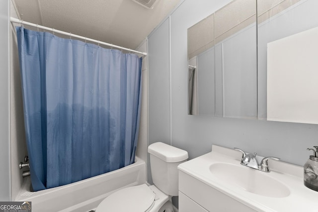 full bathroom featuring vanity, shower / tub combo, a textured ceiling, and toilet