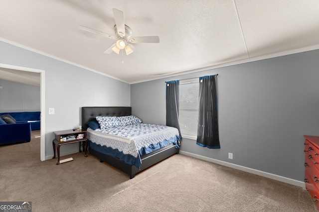 carpeted bedroom with crown molding, ceiling fan, and a textured ceiling