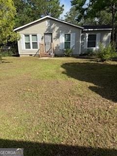 3388 Majestic Ln, Macon, GA 31217 - ranch-style house with a front yard