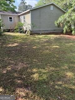 3388 Majestic Ln, Macon, GA 31217 - view of property exterior with a lawn