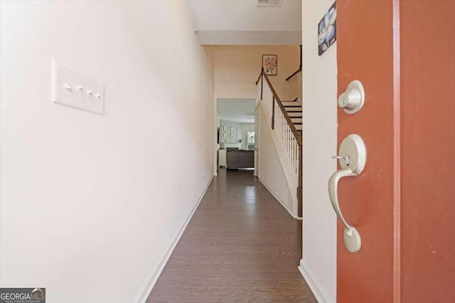 hall featuring dark hardwood / wood-style floors