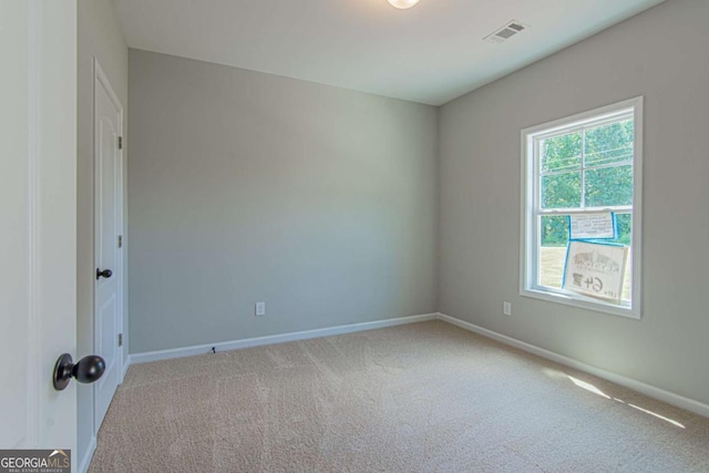 empty room with carpet flooring