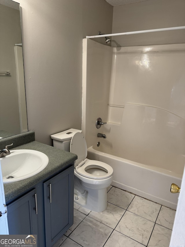 full bathroom with vanity, toilet, and bathing tub / shower combination