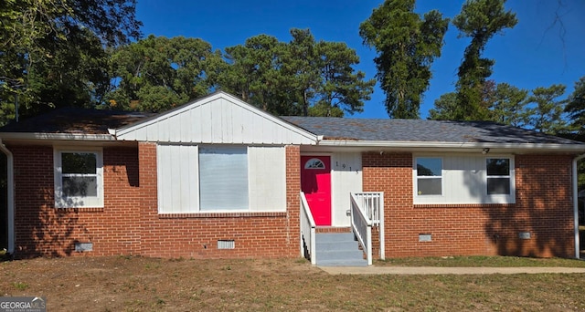 bungalow-style house with a front yard