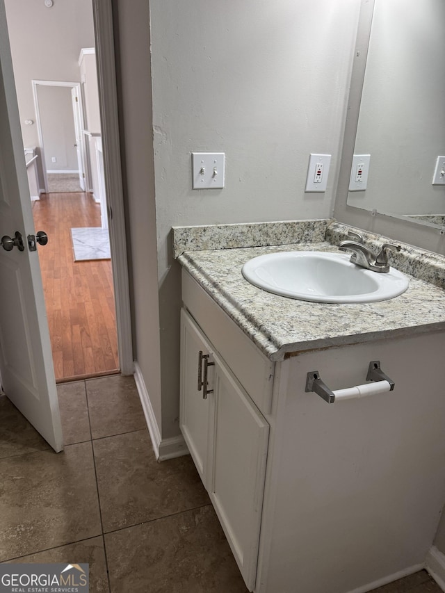 bathroom featuring vanity and tile patterned floors